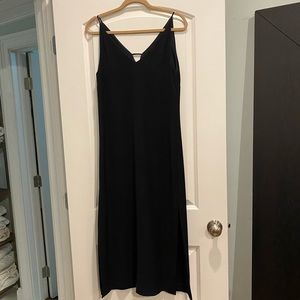 r label black dress, lined. Spaghetti straps, calf length. Size small EUC